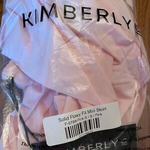 Kimberly Solid Flowy Fit Mini Skort in Pink